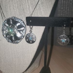 Touchstone Crystal sand dollar pendant and earrings